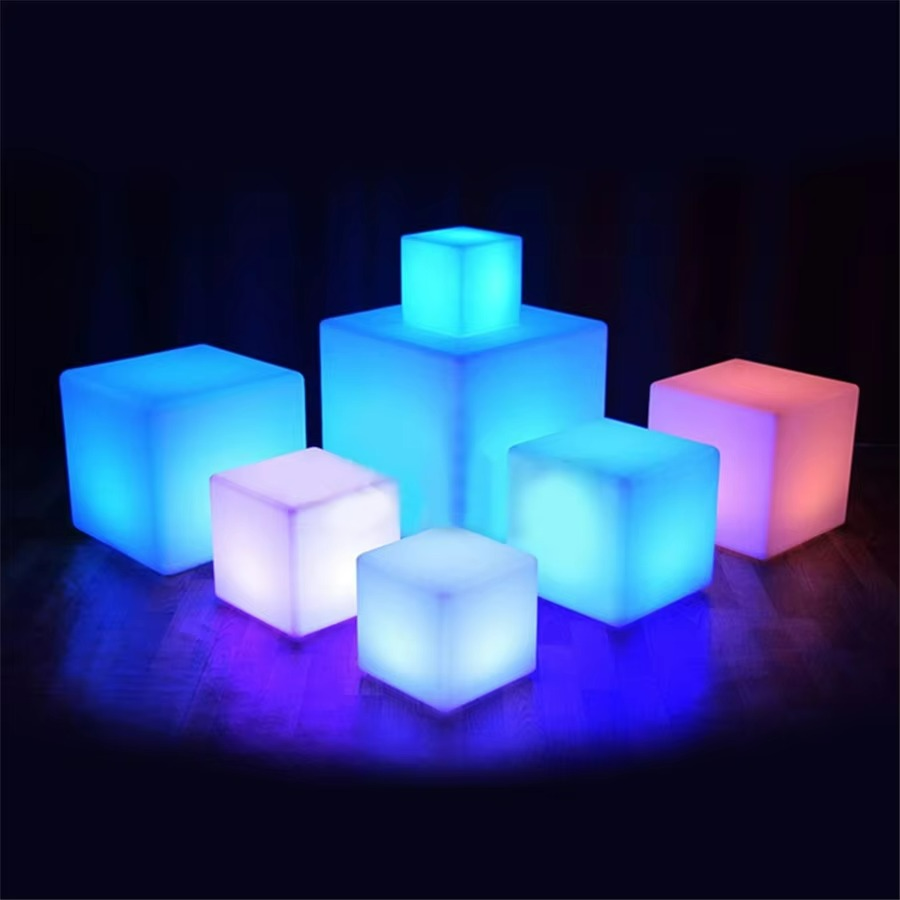 Set of colorful LED cubes on a dark background