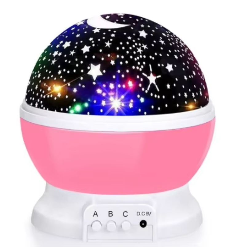 Pink and white starry night light projector on a white background