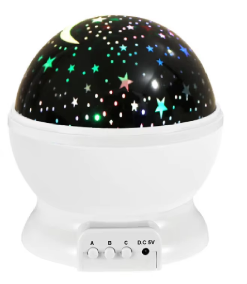 Starry night light projector with colorful stars on a black background