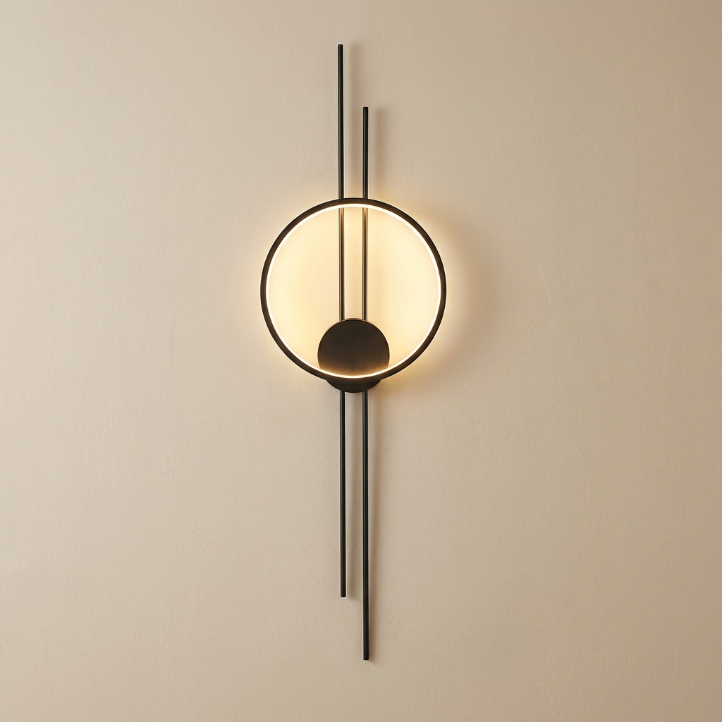 Modern wall lamp with circular design on a beige wall