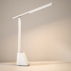 White LED desk lamp on a neutral background