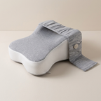 Gray and white pillow on a beige background