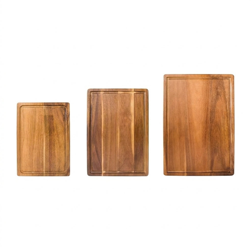 Three wooden cutting boards of different sizes on a white background