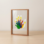 Framed colorful handprint on a plain background