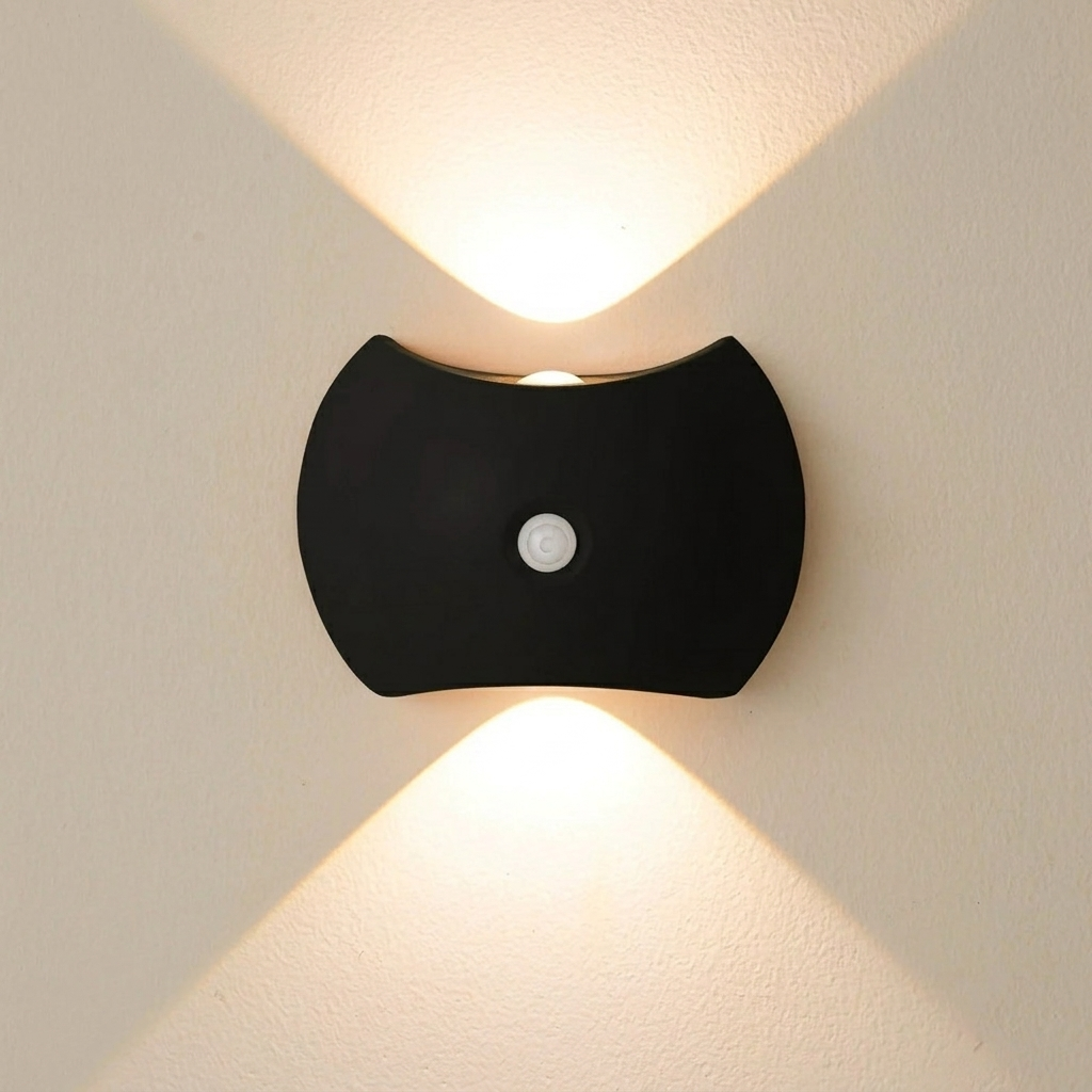 Black wall-mounted light fixture on a beige wall