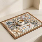 Decorative mat with geometric pattern and a cup of coffee on a white surface