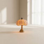 Decorative lamp with a textured shade on a neutral background