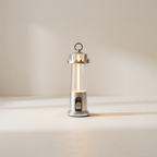 Silver lantern-style light on a beige background