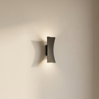 Modern wall light fixture on a plain wall