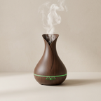 Wooden diffuser emitting steam on a beige background
