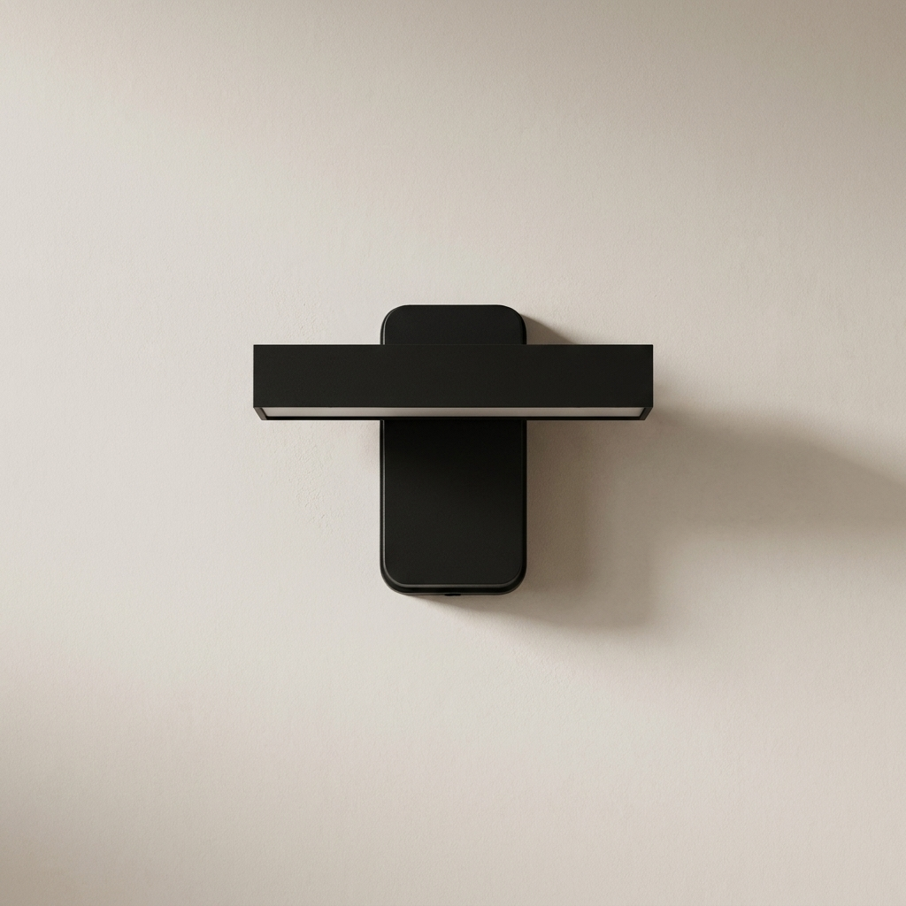 Modern black wall-mounted shelf on a beige wall
