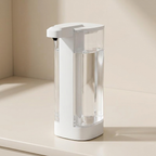 White soap dispenser on a light beige surface