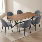Dining table set with six gray chairs in a room with a light-colored floor and wall.