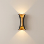 Modern wall-mounted light fixture on a plain wall