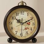 Vintage-style clock with floral design on a beige background