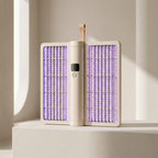 A portable electric insect zapper device with a beige body, illuminated purple grid wings, and a small hanging loop, displayed on a minimalist beige pedestal.