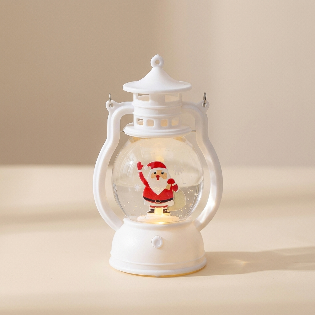 A white lantern-shaped decorative light with a clear glass globe and a small Santa Claus figure inside, photographed on a warm beige background.