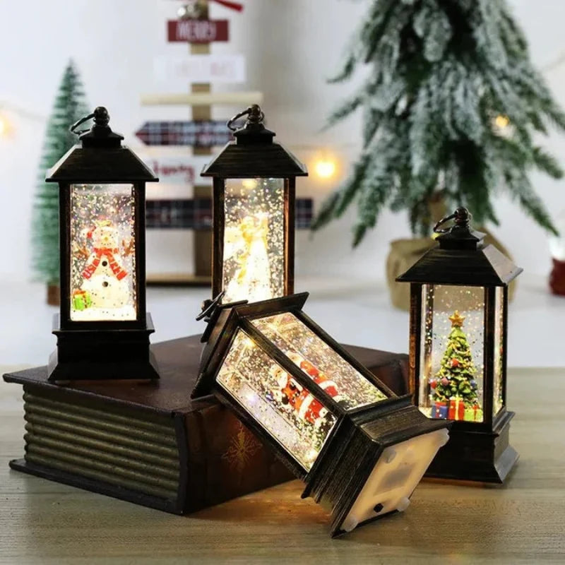 Set of decorative lanterns with Christmas scenes inside on a wooden surface.