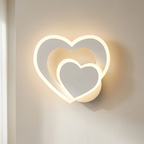 Heart-shaped wall light fixture on a neutral wall