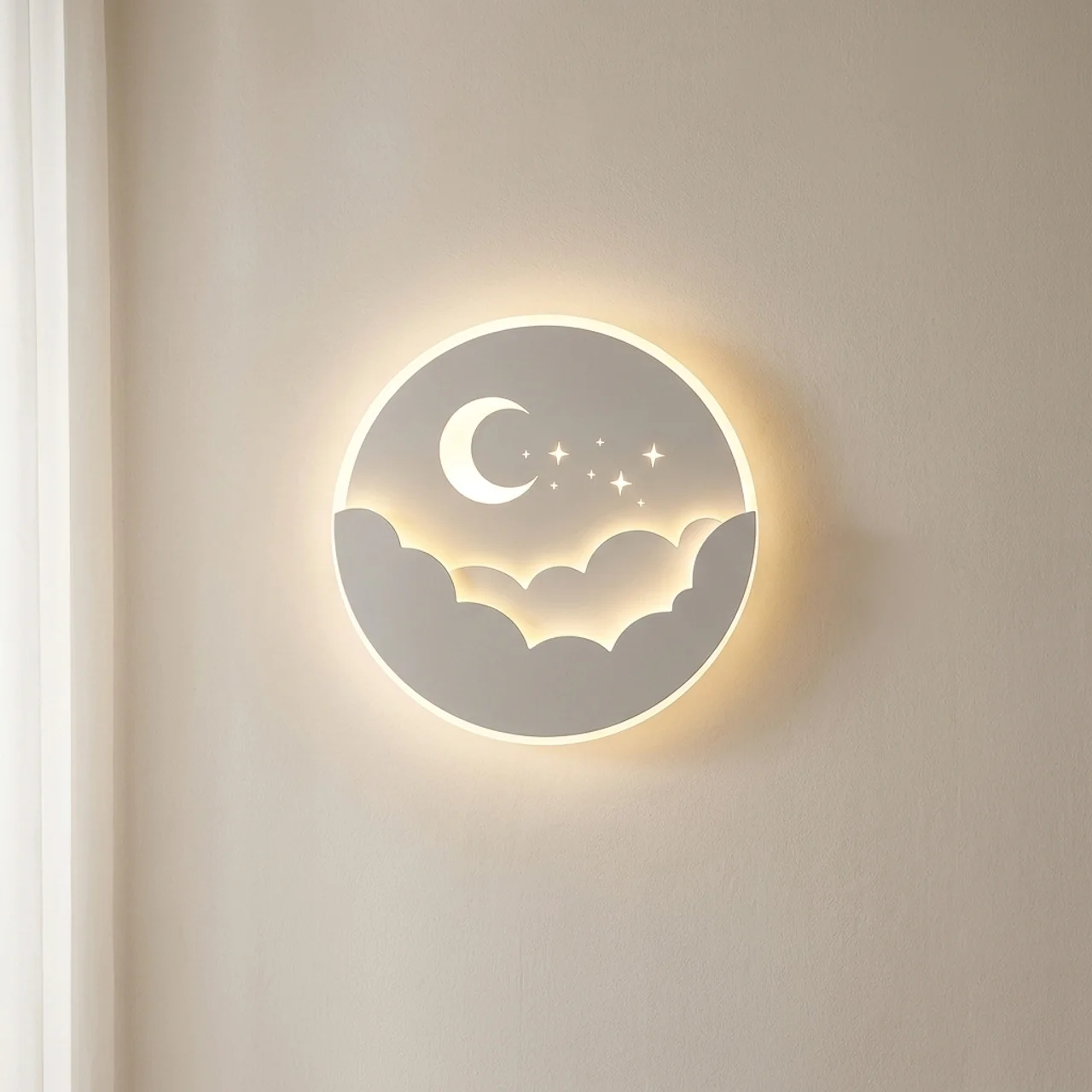 Decorative wall light with moon and cloud design on a beige wall