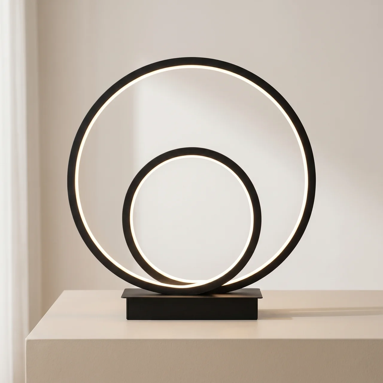 Modern table lamp with circular design on a neutral background