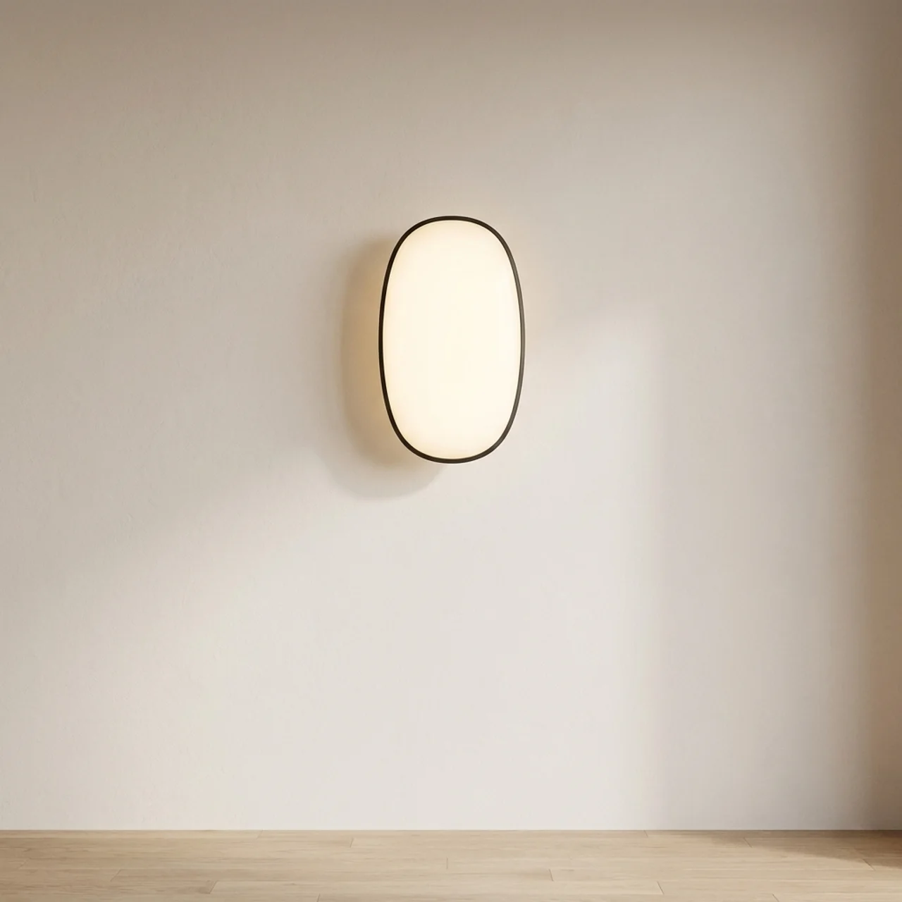 Modern wall light fixture on a plain wall with a neutral color palette.