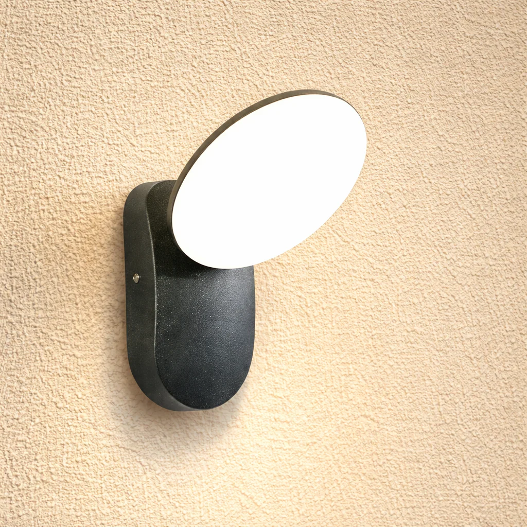 Wall-mounted light fixture on a beige wall