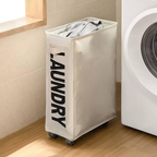 Beige laundry basket with 'LAUNDRY' text next to a washing machine in a bathroom.