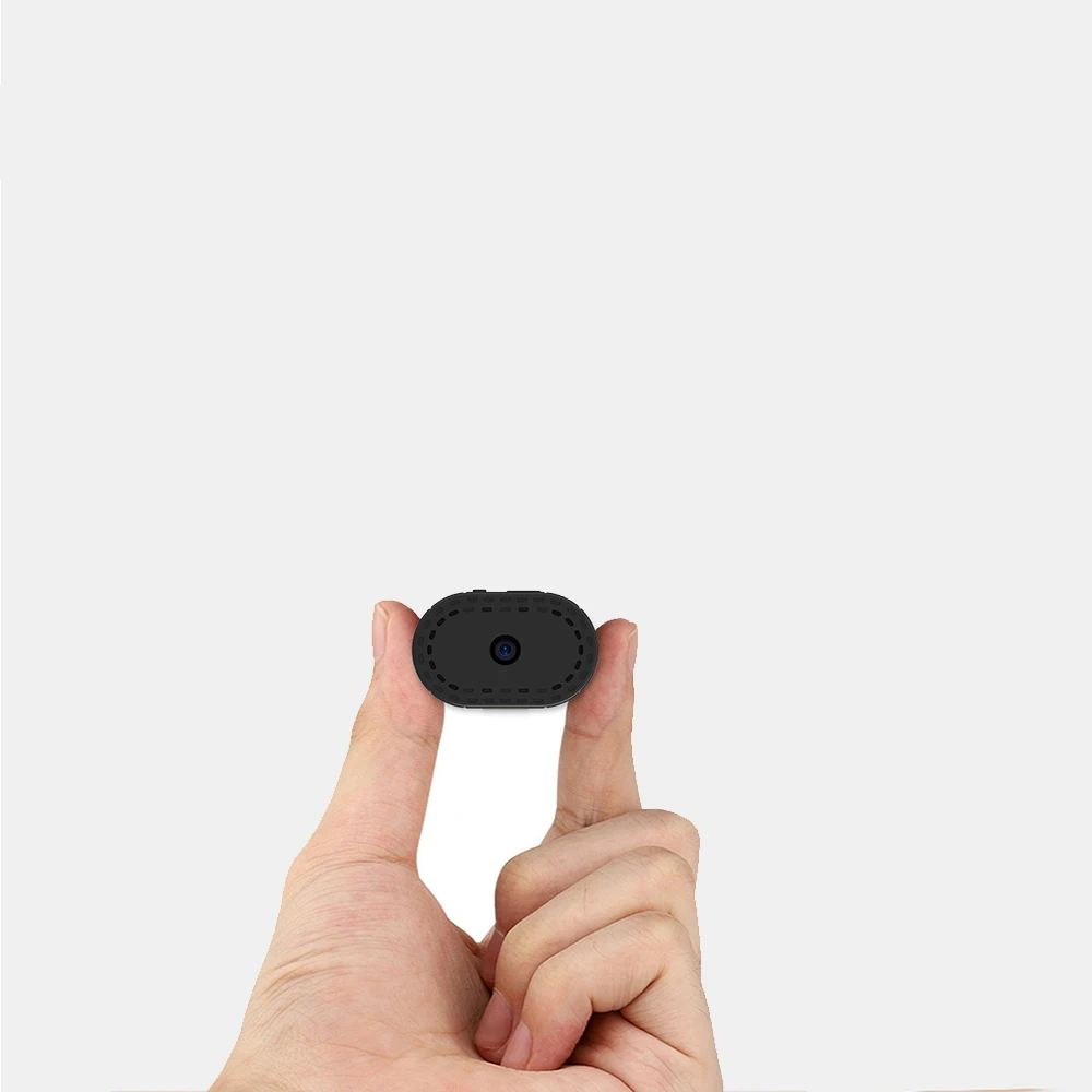 Small black device held between fingers with feature icons and text on a white background
