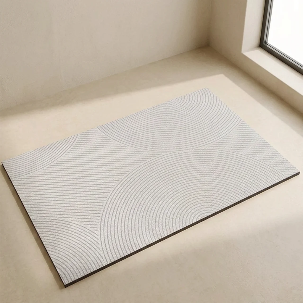 Textured rug on a beige floor with a window in the background