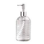 Clear glass soap dispenser with silver pump on a white background