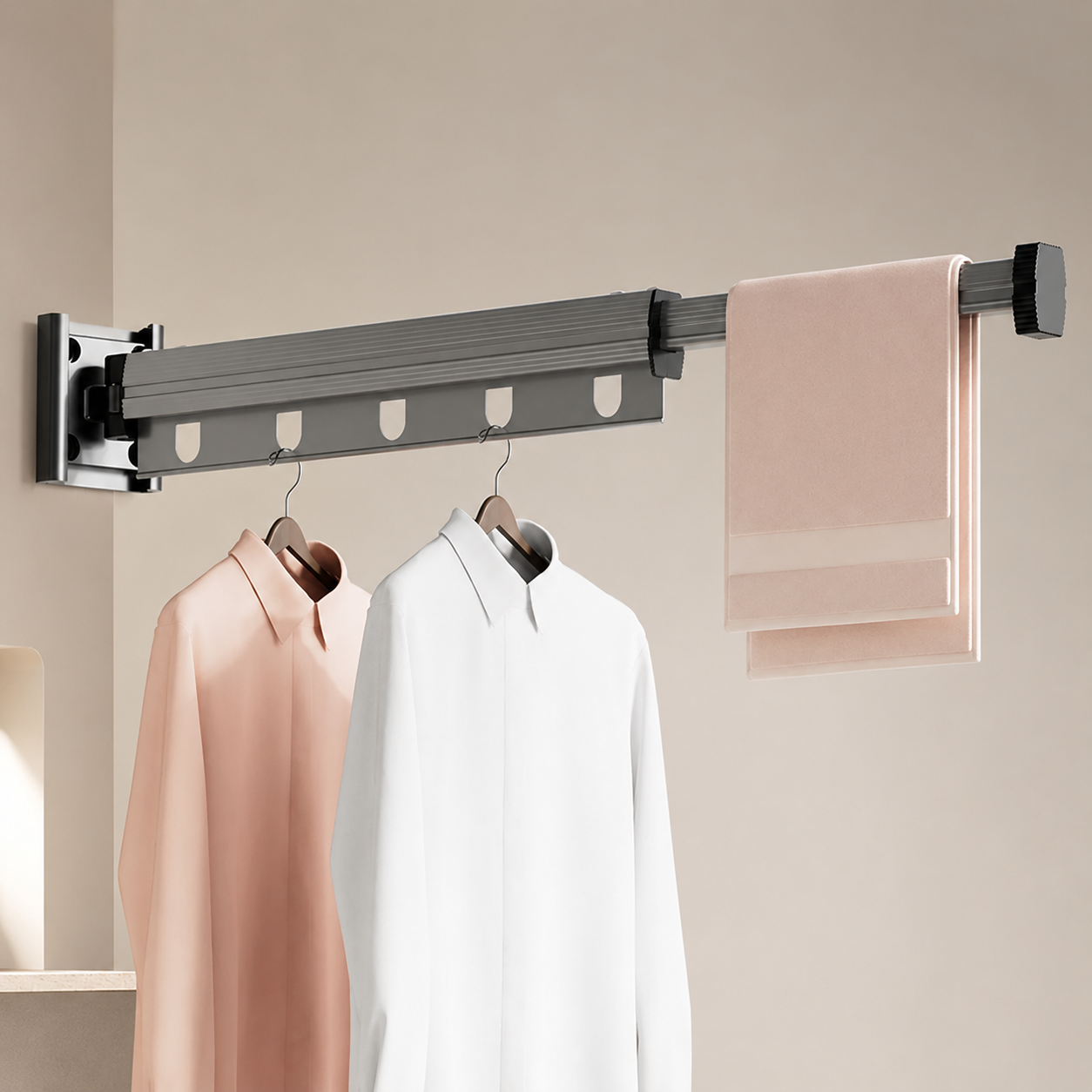 Wall-mounted clothes rack with hanging clothes against a beige wall
