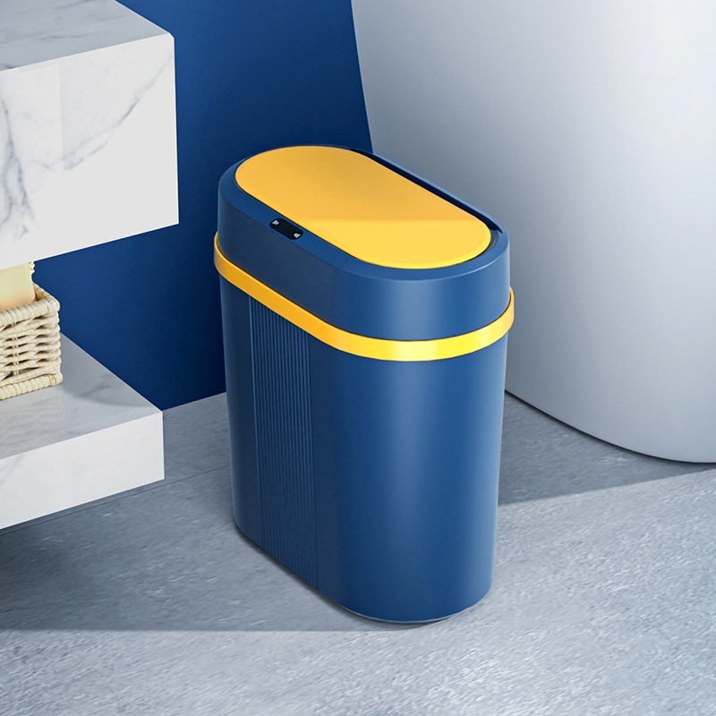 Blue and yellow trash can in a bathroom setting