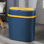 Blue trash bin with yellow rim on a gray floor