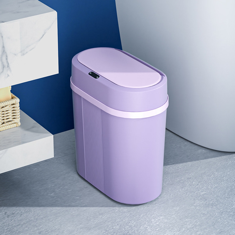 Purple trash bin in a bathroom setting with a blue wall and white bathtub.