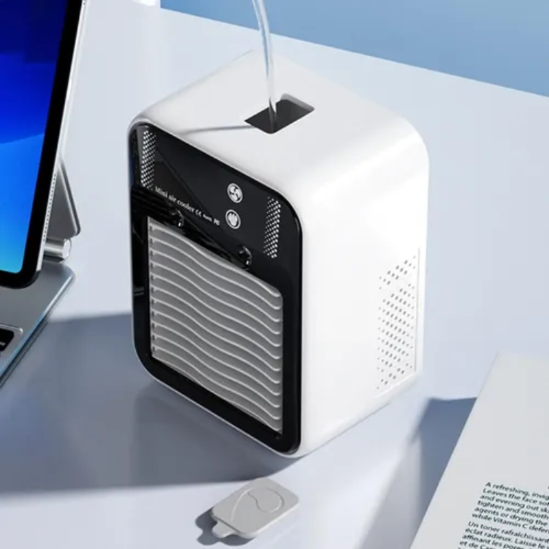 Small air purifier on a white surface with a blue background