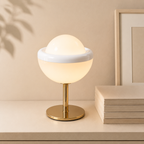 Modern table lamp with a spherical design on a neutral background