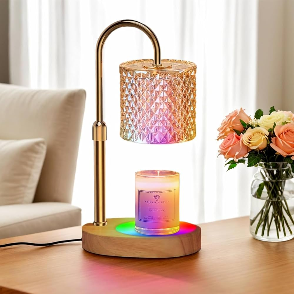 Decorative lamp with colorful light effects on a wooden base, placed on a table with a vase of flowers in the background.