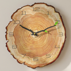 Wooden wall clock with tree ring design on a plain background