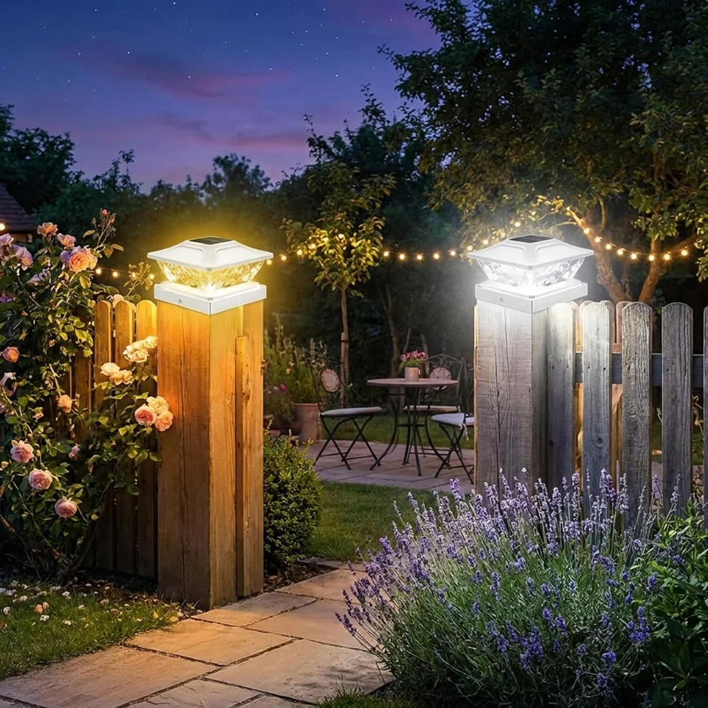 Garden pathway with decorative lights, flowers, and a small table under a starry sky.