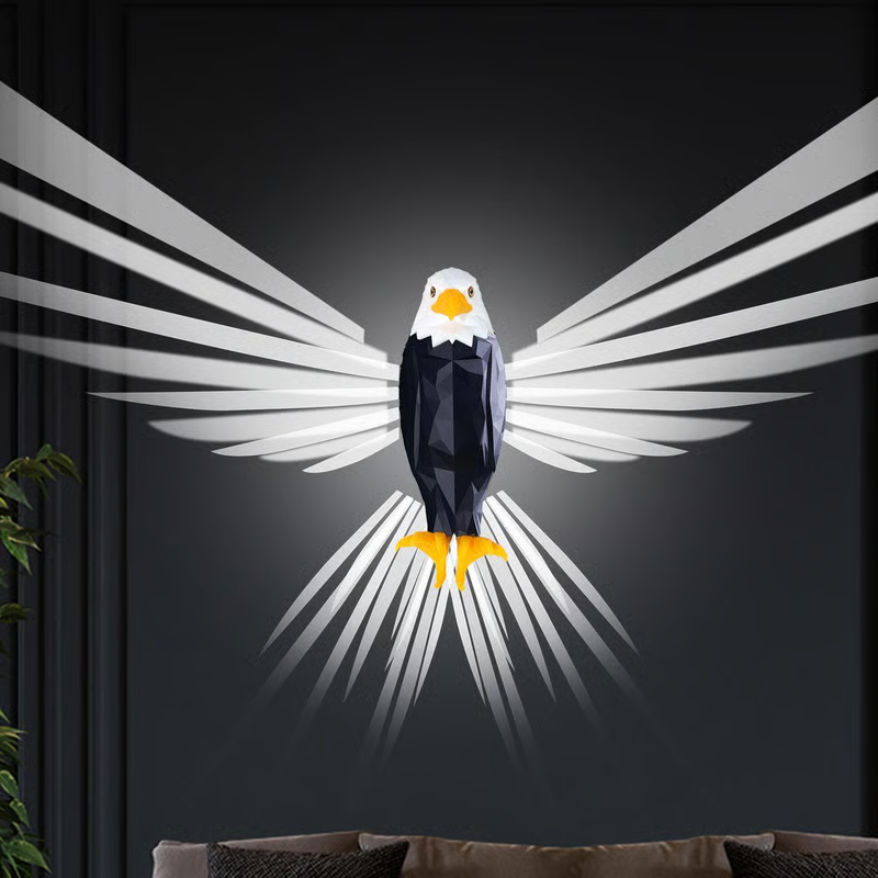 Eagle design on a wall with white rays against a dark background