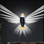 Eagle design on a wall with white rays against a dark background