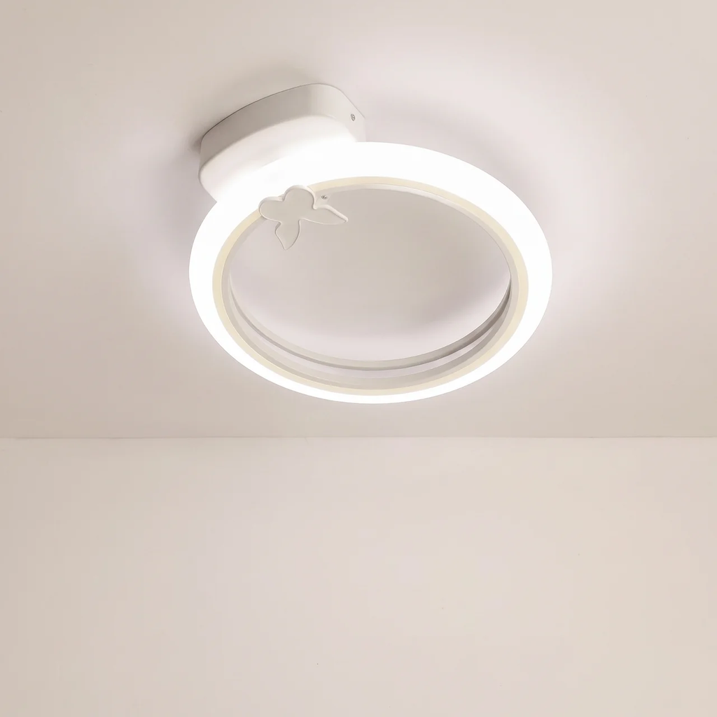 A modern circular LED ceiling light fixture with a butterfly accent, shown installed on a plain off-white ceiling.