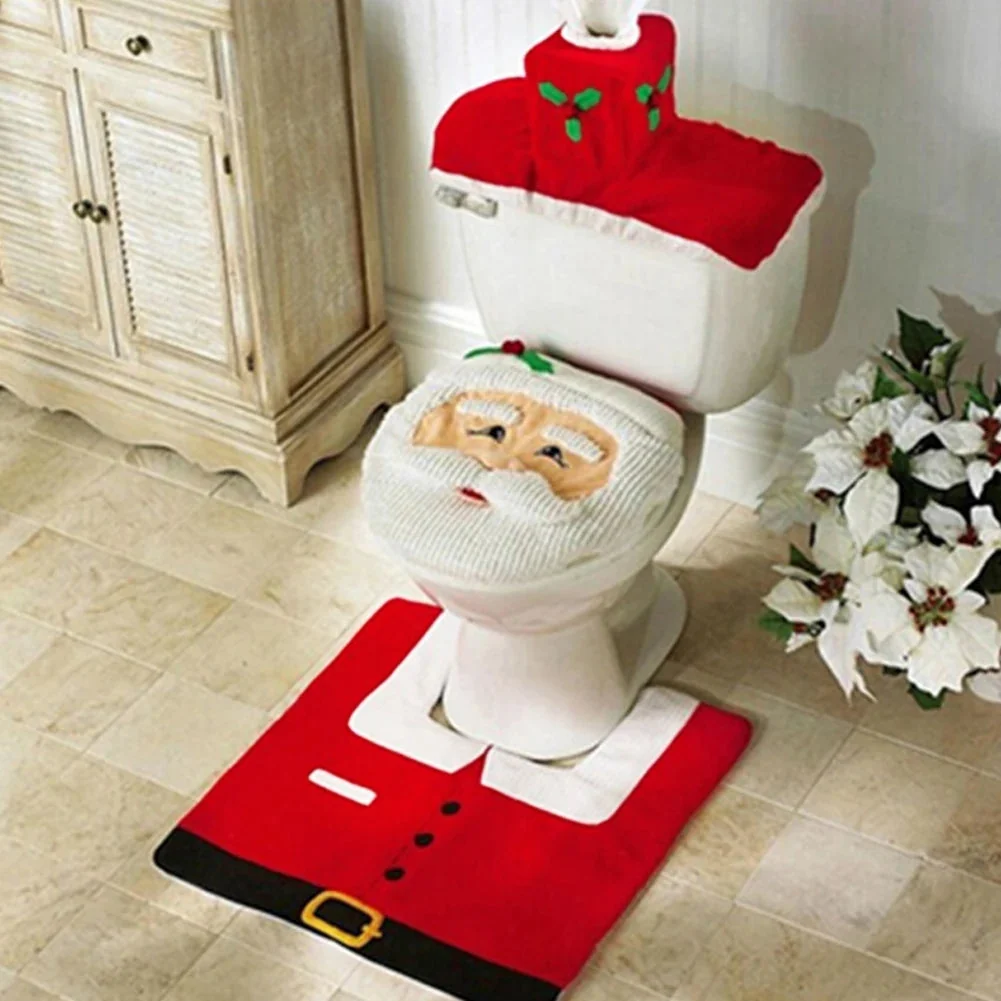 Bathroom set with Santa Claus-themed toilet cover, seat cover, and rug.