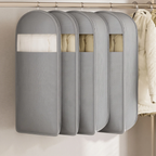 Four gray garment storage bags hanging on a closet rod, with a cream puffer jacket partially visible on the right side.