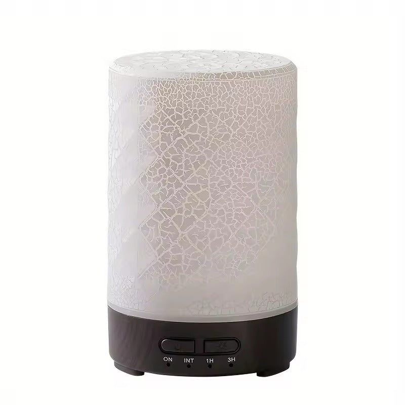 Cylindrical diffuser with textured white surface and black base on a white background