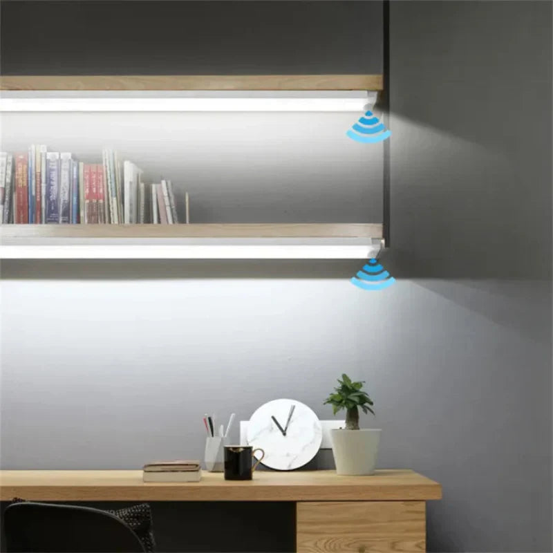 Smart light bulb on a desk with a bookshelf in the background
