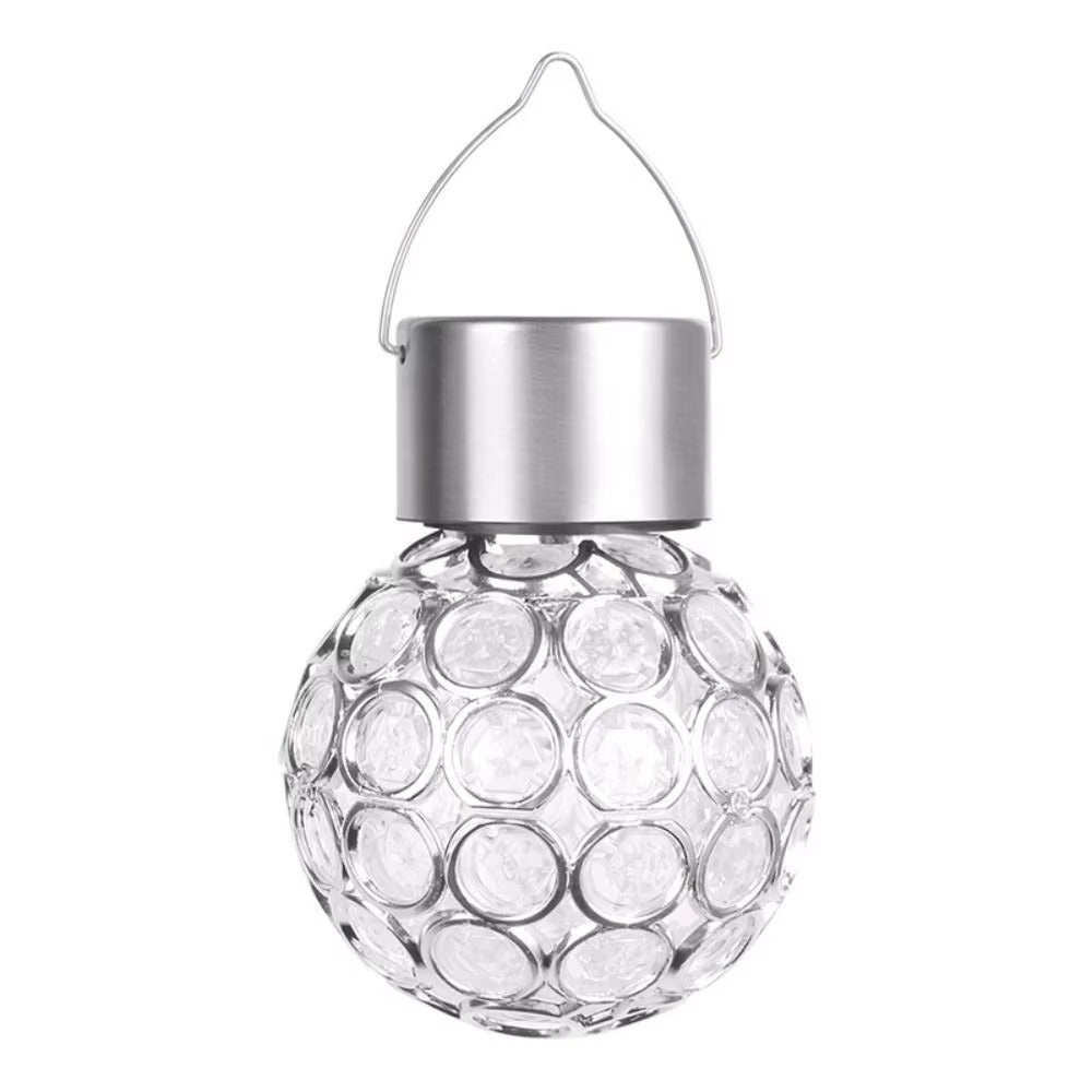 A clear glass solar-powered hanging ornament with a textured circular bubble pattern, a brushed silver metal cap, and a thin silver wire loop at the top, shown against a plain white background.