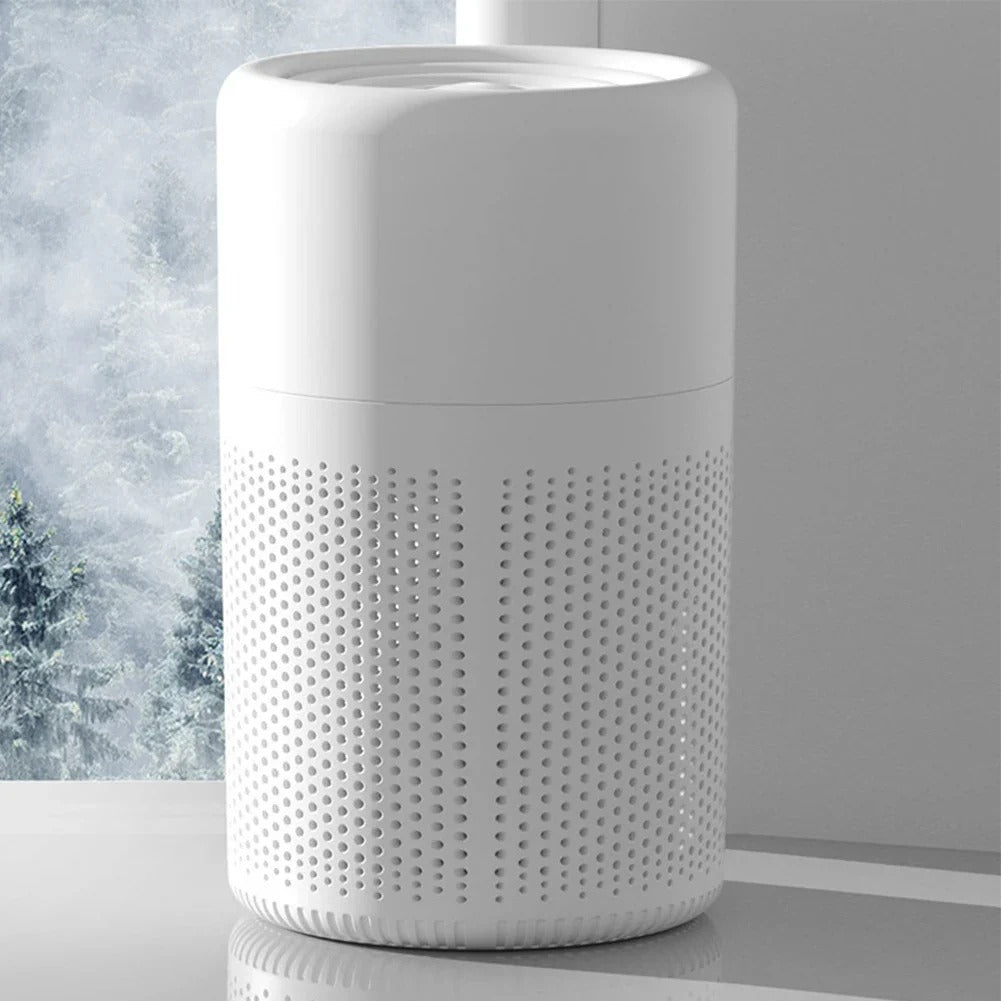 White textured cylindrical container on a light gray surface with a blurred snowy outdoor scene in the background.