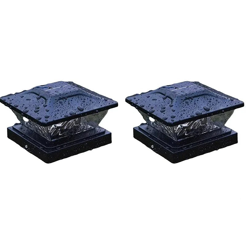 Two solar fence lights with black shells on a white background, showing an inset image of the lights illuminated.